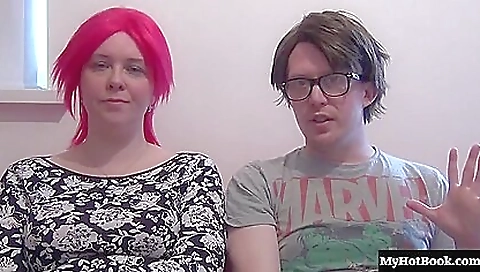 Redheaded babe wearing sexy lingerie and showing off her tits