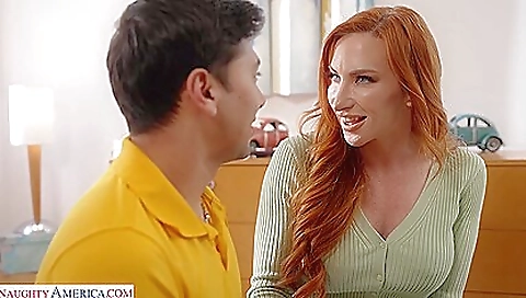 Busty redhead milf with a big ass and tits shows her