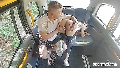 Ebony in black shorts and stockings playing with a money slip