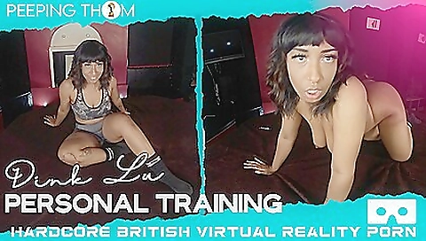 A hot brunette with a tattooed body is getting a dildo