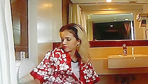 Horny brunette with a shaved pussy pissing on her ass in vr porn