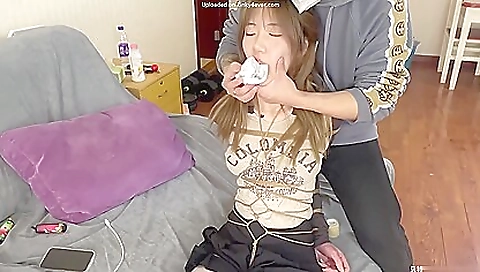 Chinese babe with a big pussy enjoys a kinky bdsm fuck