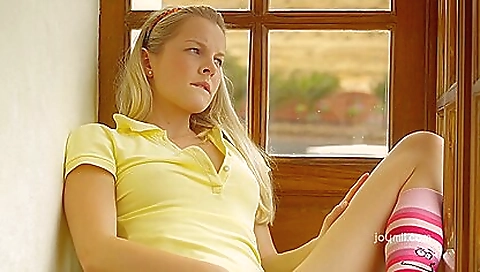 Stunning blond girl in a white towel is naked on camera