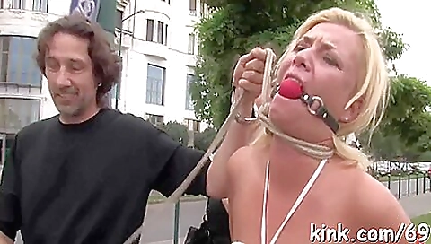 Busty teen playing with her shaved pussy in a public outdoor