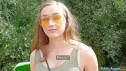 Beautiful amateur brunette in a pink bikini outside