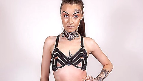 Sexy naked solo girl with small tits is wearing nothing