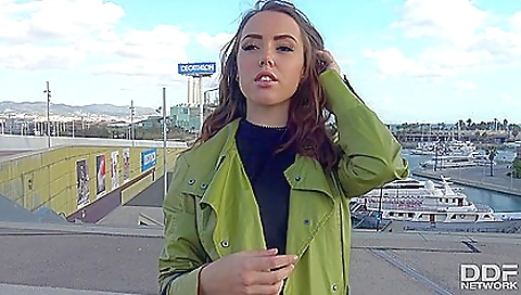 Brunette in black dress is with a man in the middle of a private tour